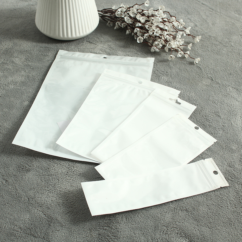 Bolsa autosellante Película de perlas Yin y Yang bolsa de hueso translúcido bolsa de plástico bolsa de embalaje de la cáscara del teléfono móvil bolsa de plástico 100 unids/bolsa