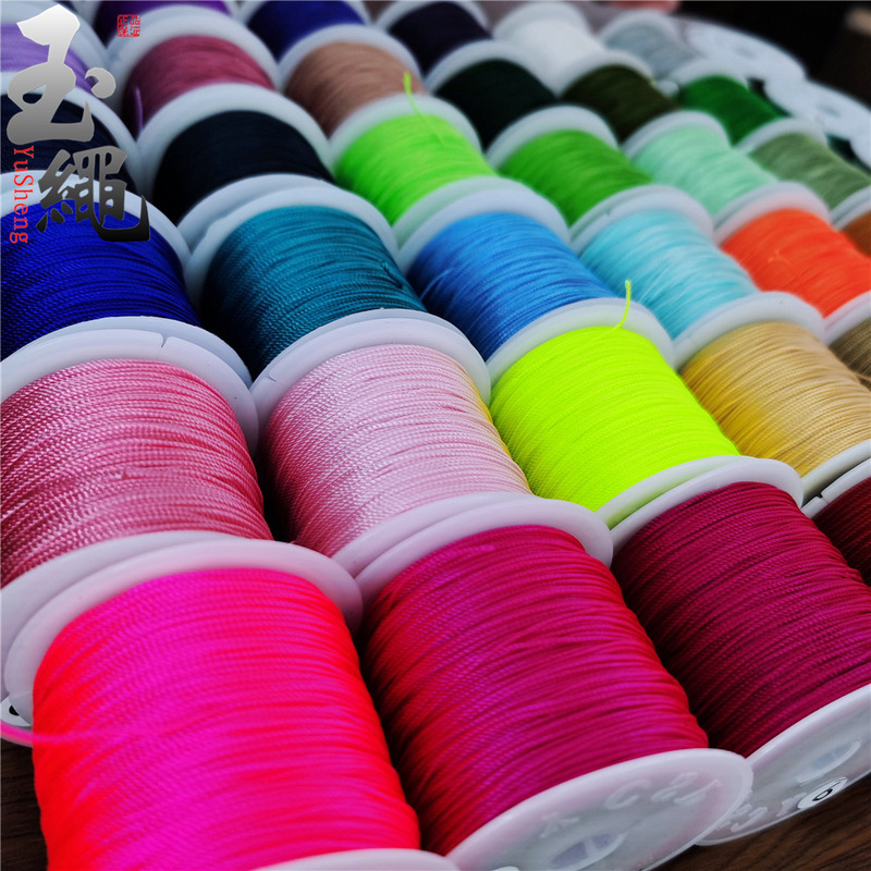Small roll Golden three fish strands nylon line bracelet rope pendant rope material hand braided line wholesale 2 link Small roll Golden three fish strands nylon line bracelet rope pendant rope material hand braided line wholesale 2 link