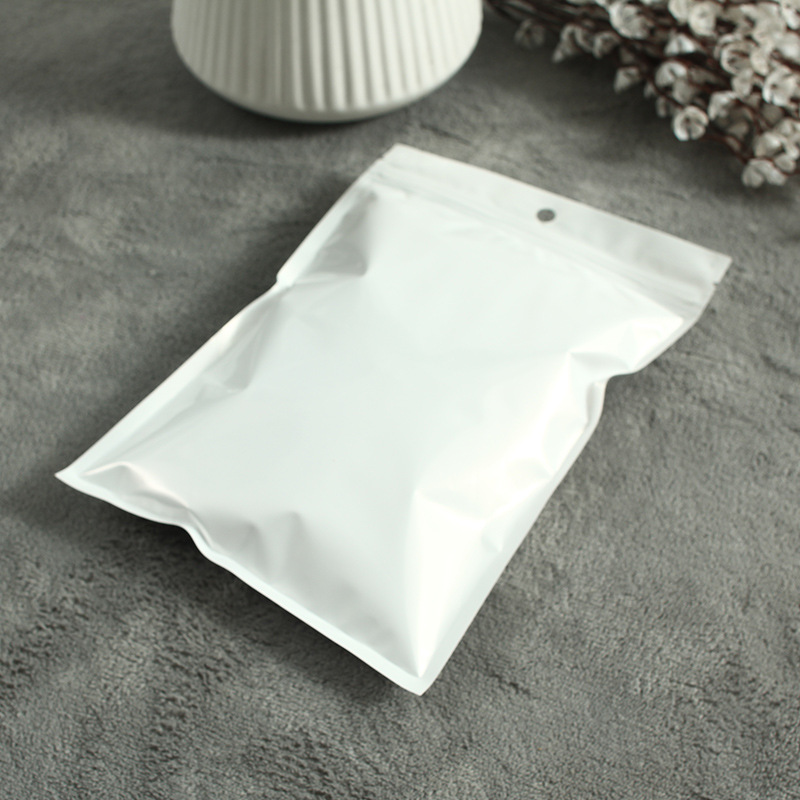 Bolsa autosellante Película de perlas Yin y Yang bolsa de hueso translúcido bolsa de plástico bolsa de embalaje de la cáscara del teléfono móvil bolsa de plástico 100 unids/bolsa