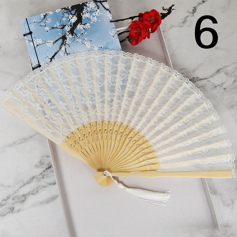 Ventilador plegable de estilo japonés ventilador de encaje hueco ventilador antiguo de estilo chino al por mayor VENTILADOR DE Cheongsam ventilador de pasarela de escenario ventilador de estilo europeo