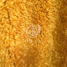 经编澳羊卷圈圈绒羊羔绒姜黄色服装面料人造毛绒皮草经编颗粒绒