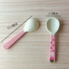 Round strawberry, spoon