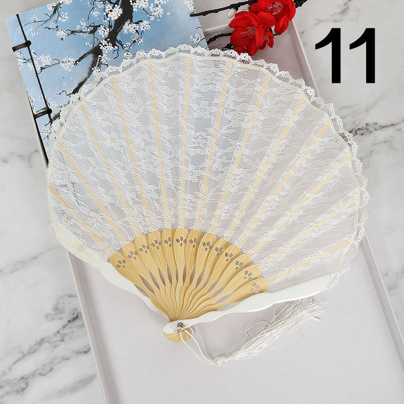 Ventilador plegable de estilo japonés ventilador de encaje hueco ventilador antiguo de estilo chino al por mayor VENTILADOR DE Cheongsam ventilador de pasarela de escenario ventilador de estilo europeo