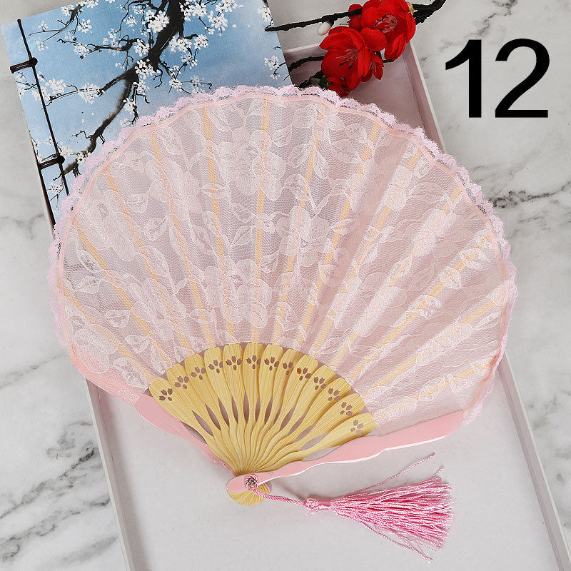 Ventilador plegable de estilo japonés ventilador de encaje hueco ventilador antiguo de estilo chino al por mayor VENTILADOR DE Cheongsam ventilador de pasarela de escenario ventilador de estilo europeo