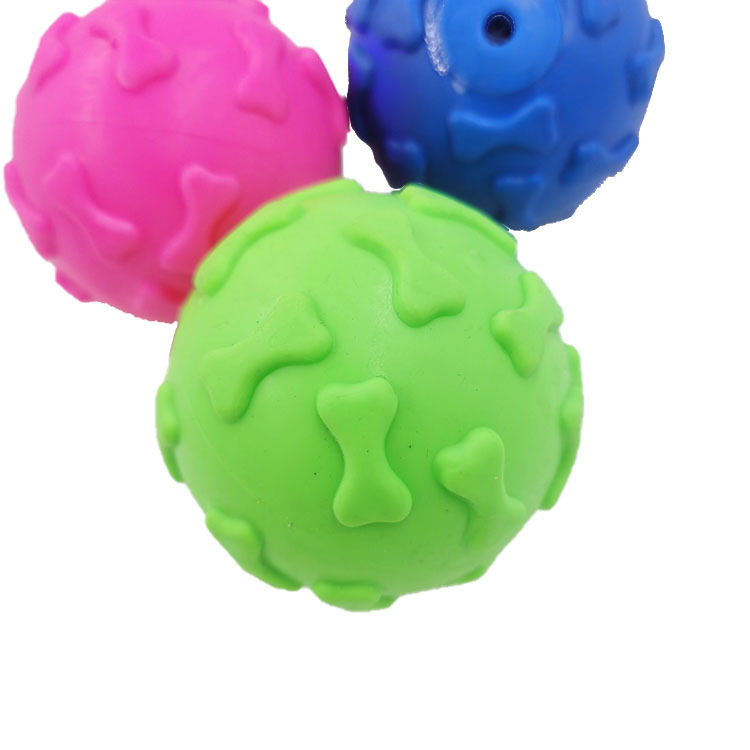 Pet TPR Bola de hueso de goma de juguete perro molar mordedura resistente a la fábrica de bolas de juguete de sonido en stock al por mayor