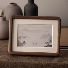 Black walnut rounded-edge solid wood picture frames, meticulously handcrafted and finely sanded, available in multiple sizes: 6-inch, 7-inch, 8-inch, and 10-inch.