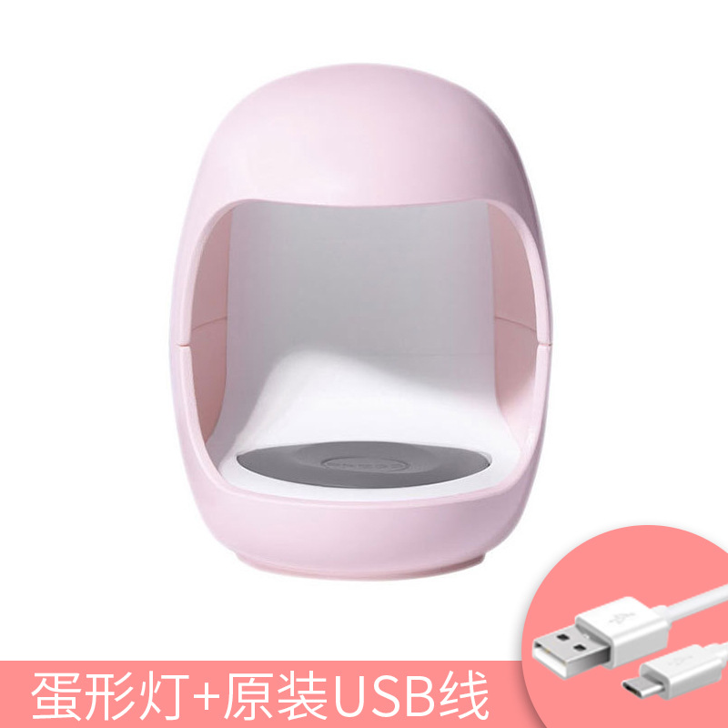 Mini máquina de terapia de uñas rosa lámpara portátil de terapia de luz tipo huevo una sola lámpara de uñas de secado rápido lámpara de horneado fábrica directa