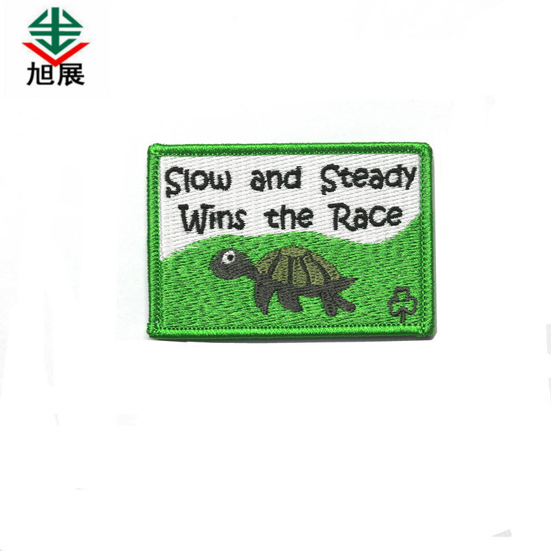 厂家直供服装商标 高档绣花标 绣花章 毛巾绣 毛毡绣满绣背胶布贴