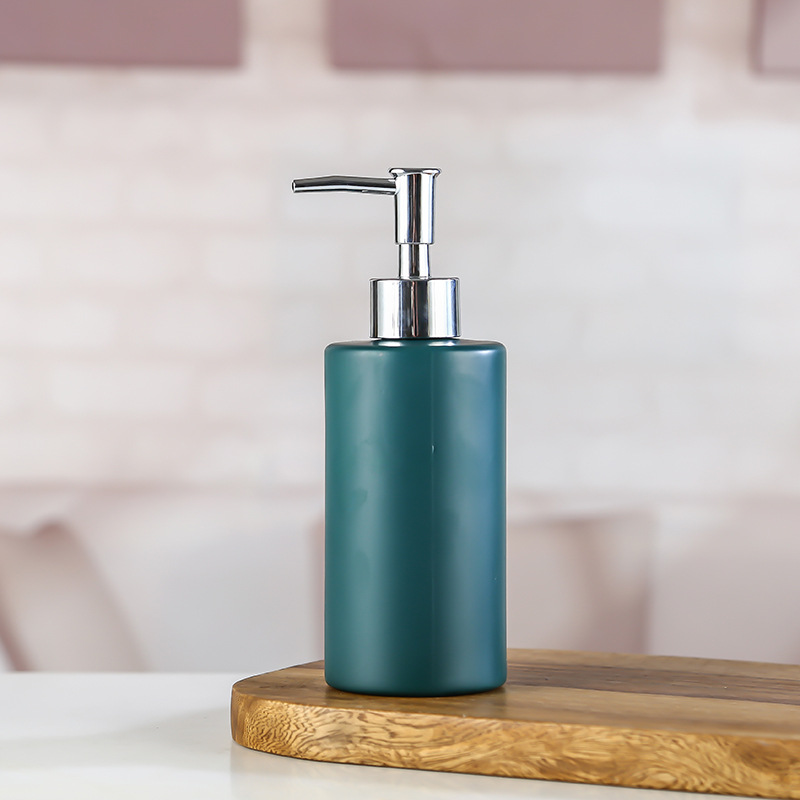 Descuentos de los fabricantes para rociar color cilíndrico con puntos de oro botella de vidrio desinfectante para manos gel de ducha champú embotellado