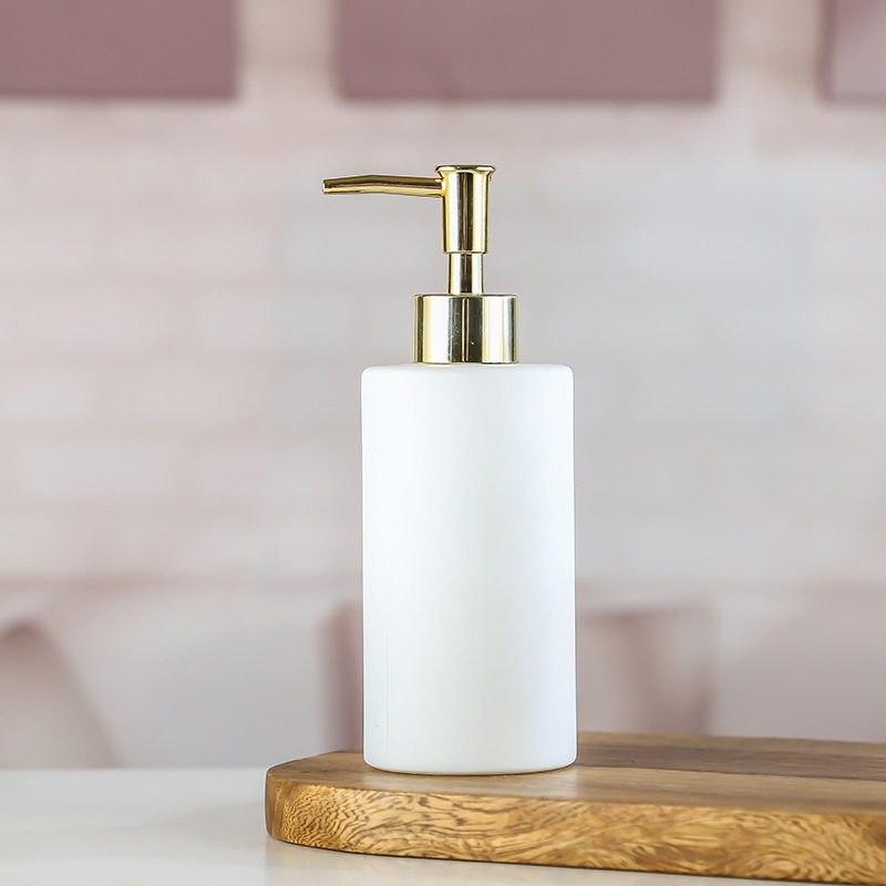 Descuentos de los fabricantes para rociar color cilíndrico con puntos de oro botella de vidrio desinfectante para manos gel de ducha champú embotellado