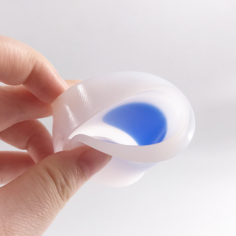 Aumento de la altura interior de la plantilla de silicona de los hombres y las mujeres resistente al desgaste a prueba de golpes descompresión jalea cómodo Q almohadilla elástica del talón de la mitad del tamaño posavasos en forma de U