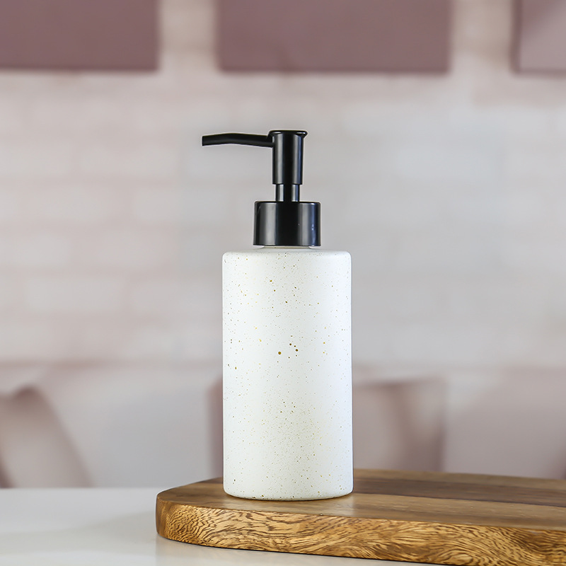 Descuentos de los fabricantes para rociar color cilíndrico con puntos de oro botella de vidrio desinfectante para manos gel de ducha champú embotellado