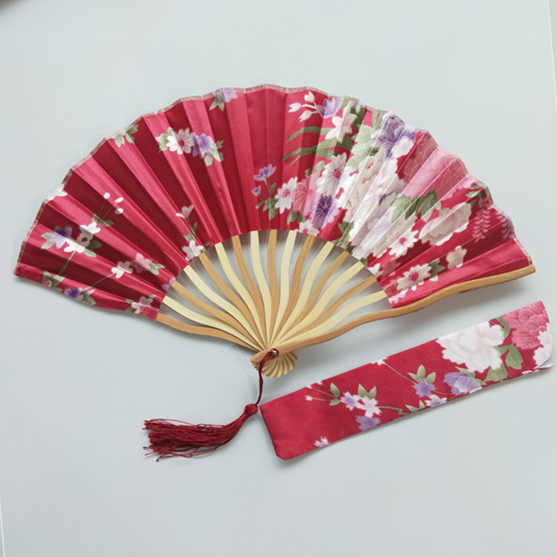 Transfronterizo de satén dragón ventilador más bolsa de ventilador S ventilador de hueso blanco cheongsam rendimiento dama ventilador 15 colores opcionales