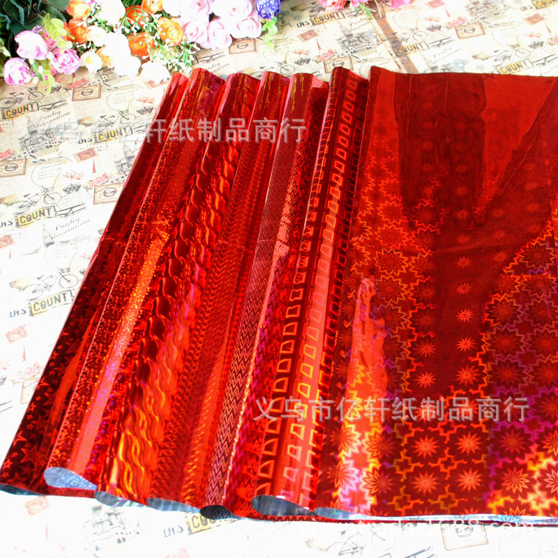 Suministro directo de fábrica OPP láser aluminizado película envoltura papel impresión láser flash película de plástico 70*100cm
