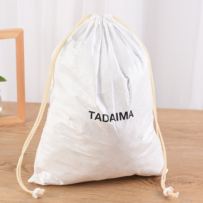 批发杜邦纸袋手提购物袋定做束口抽拉绳收纳袋定制logo环保可降解