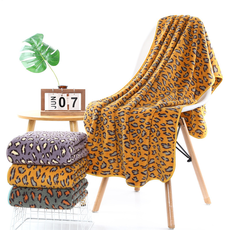 Factory wholesale New tremolo fast hand net red with leopard print coral fleece bath towel adult beach towel a generation of hair Factory wholesale New tremolo fast hand net red with leopard print coral fleece bath towel adult beach towel a generation of hair