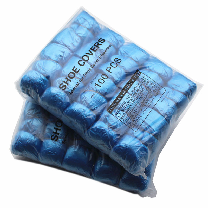 Fábrica al por mayor desechable PE cubierta de zapatos no tejida cubierta de pie engrosada hogar T-tipo máquina de plástico zapatos película antideslizante