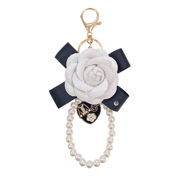 Moda nuevo arco Camelia llavero creativo perla cadena pu cuero Rosa colgante Accesorios image 7
