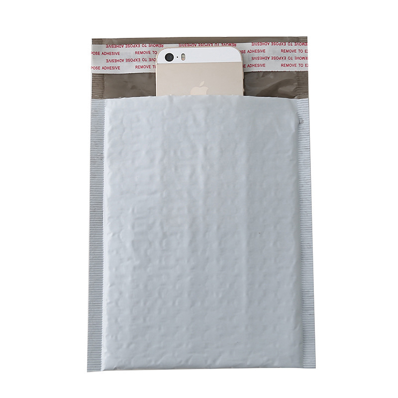 En stock bolsa de burbuja de película coextruida engrosada ropa impermeable bolsa de embalaje expreso bolsa de espuma de película de burbuja compuesta al por mayor