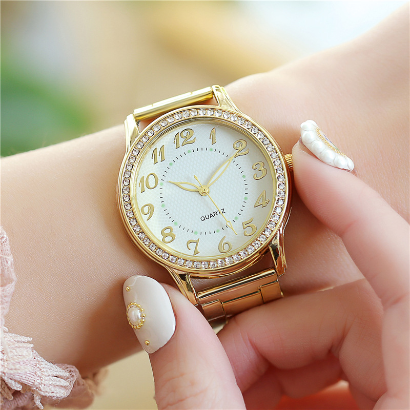 AliExpress popular diamante-incrustado luminoso reloj casual de las mujeres de negocios de acero correa de las mujeres reloj de cuarzo reloj fabricante al por mayor