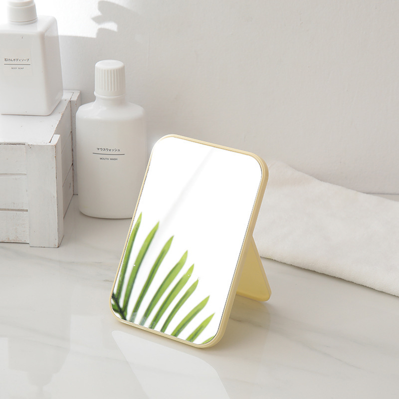 Espejo de maquillaje portátil plegable de escritorio dormitorio de estudiantes espejo pequeño espejo de tocador femenino tamaño pequeño espejo de princesa portátil