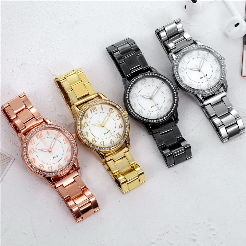 AliExpress popular diamante-incrustado luminoso reloj casual de las mujeres de negocios de acero correa de las mujeres reloj de cuarzo reloj fabricante al por mayor