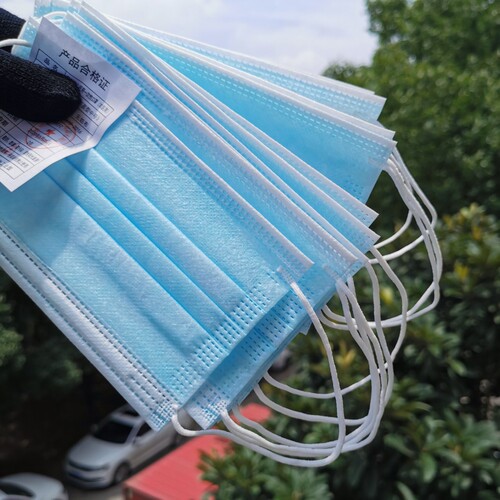 A pack of ten civilian black and white blue disposable 3-layer meltblown cloth for adults and children dustproof