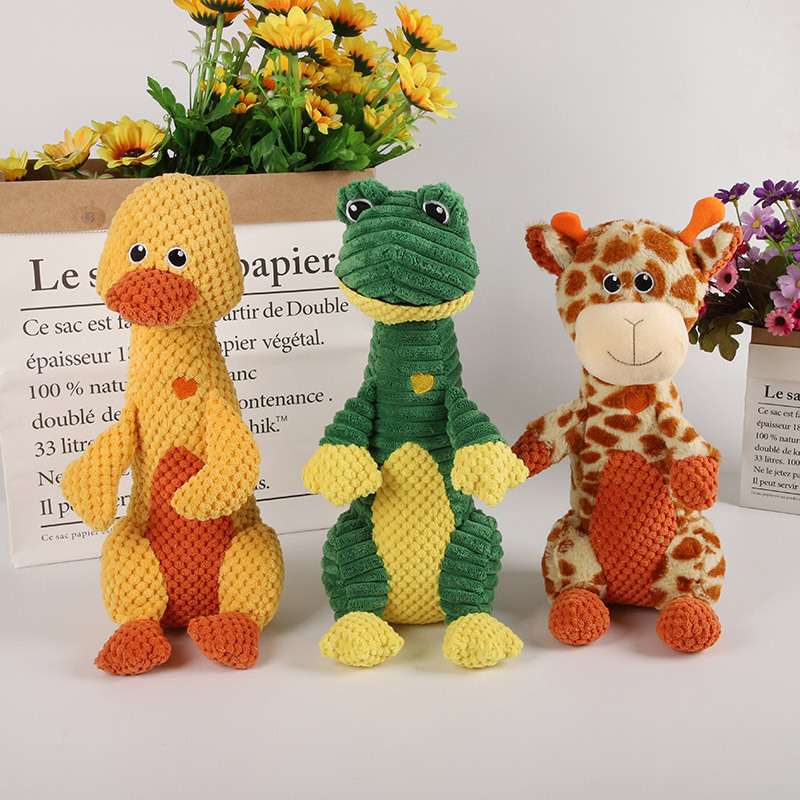 Nuevos suministros para mascotas perro de peluche de juguete molar resistente a la mordedura de pana tres animales muñeca de sonido pato amarillo al por mayor