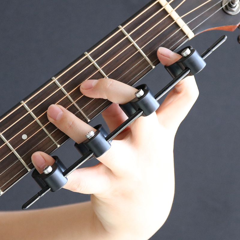 乐器通用扩指器吉他配件辅助神器和弦开指器手指训练器钢琴练习器