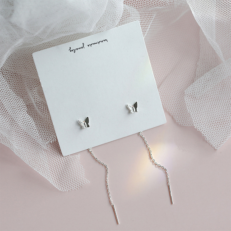 Pendientes de mariposa de baile de luz de diseño creativo romántico Pendientes románticos Pendientes largos de temperamento de hadas súper accesorios de regalo japoneses y coreanos femeninos