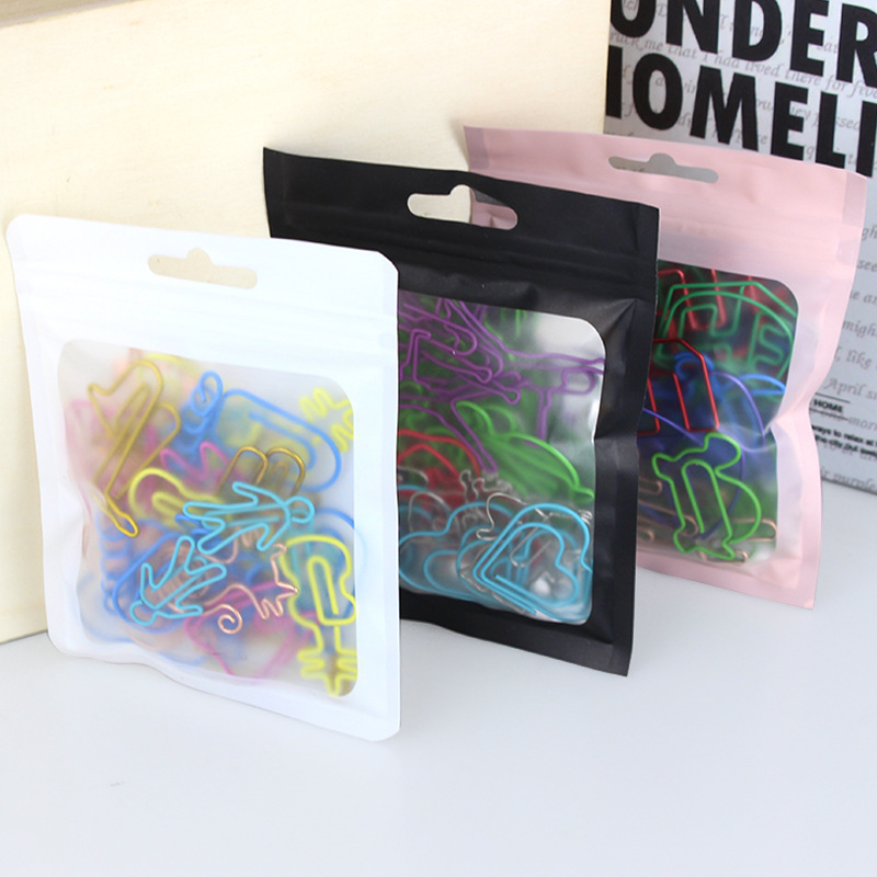Los clips de papel de color de Venta caliente transfronteriza se adaptan a clips de papel creativos de forma especial clips de papel bolsa ciega 30 paquetes de Oficina Creativa