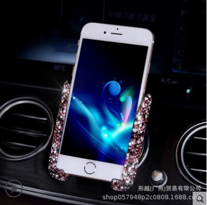 Coche transfronterizo Soporte de teléfono móvil incrustado en diamante Marco de navegación Asiento de salida de aire de doble propósito Gravedad Soporte de teléfono móvil Soporte femenino