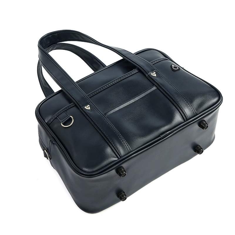 One‑shoulder Japanese school handbag, polyurethane, compact rectangular design, decorative metal accents