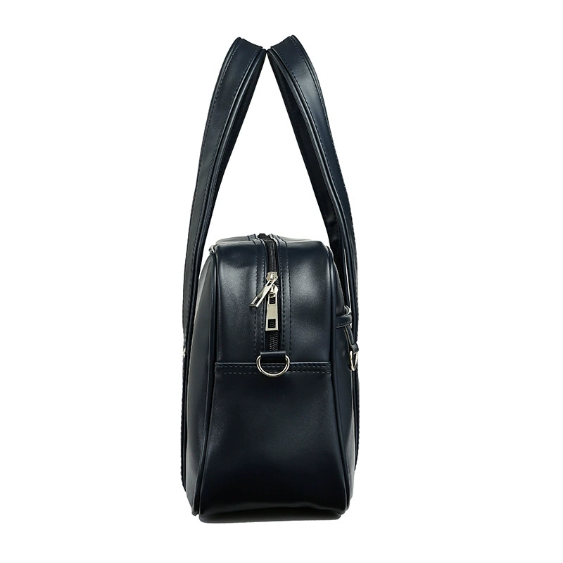 One‑shoulder Japanese school handbag, polyurethane, compact rectangular design, decorative metal accents