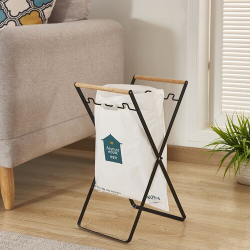 Factory direct sales Nordic iron folding handbag garbage rack kitchen bedroom living room storage rack creative storage rack
