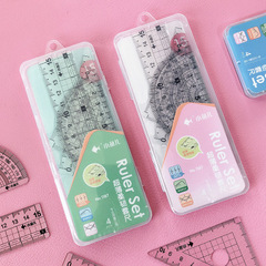 Set of 4 school stationery drawing tools for primary school students: ruler, set square, protractor, and combination scale