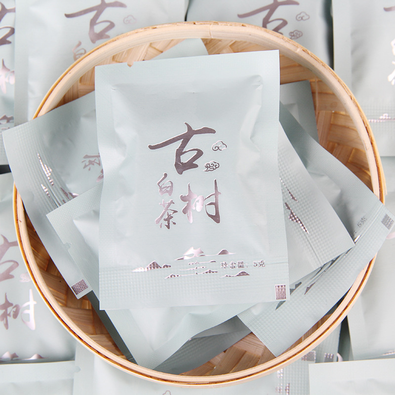 Wholesale convenient packaging Yunnan white tea biscuit honey fragrant old white tea Alpine Tea ancient tree White Tea brick 500g
