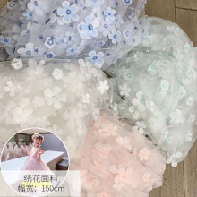 新款网纱激光立体绣花面料 春夏女童连衣裙时装现货刺绣蕾丝面料