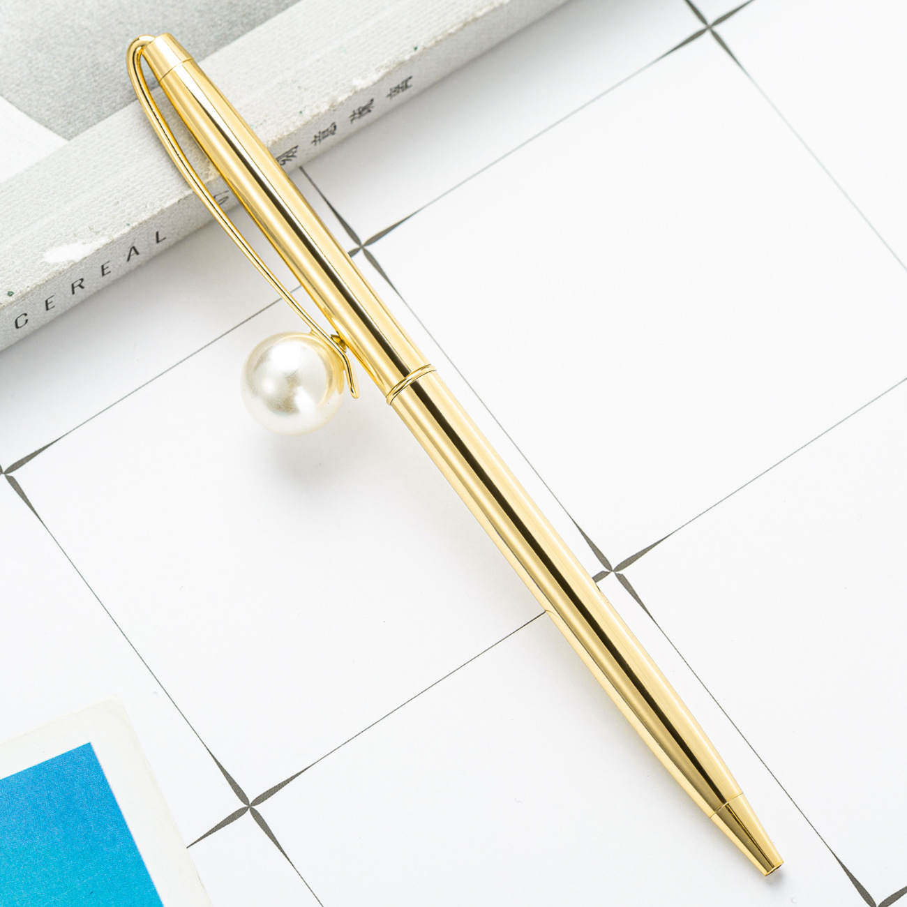 Fábrica en stock nuevo bolígrafo de metal perla pequeña pluma de regalo fresco pluma de publicidad al por mayor impresión de logotipo