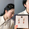 Retro ear clips from pearl, long earrings with tassels, no pierced ears, European style, wholesale