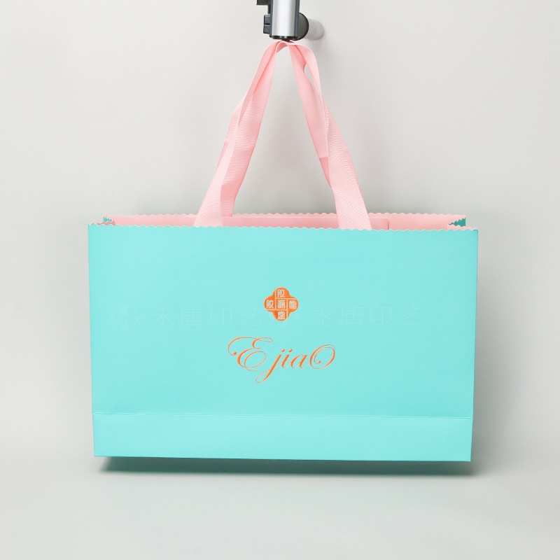 现货化妆品手提纸袋服装礼品袋牛皮纸袋定 做广告袋印刷logo批发