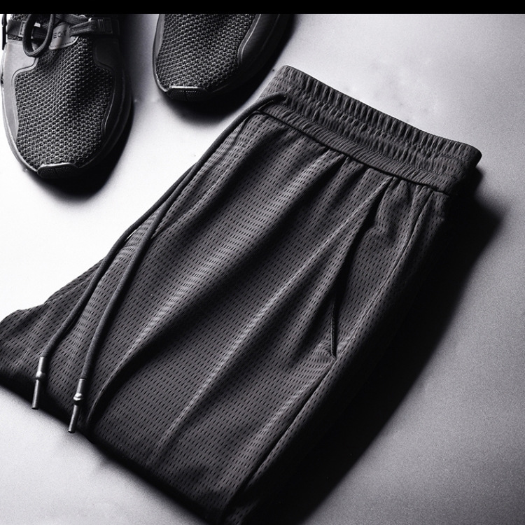 Pantalones de seda fina de verano para hombre, pantalones largos casuales y versátiles, pantalones deportivos holgados, joggers elásticos de ajuste delgado hasta la rodilla.