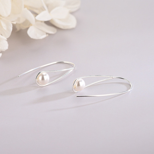 Under the Banyan Tree S925 silver hollow drop-shaped ear hooks with artificial shell beads, feminine design, one-piece generation earrings