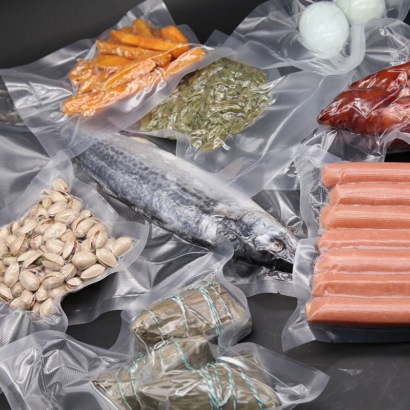 Bolsas de vacío de calidad alimentaria, bolsas de embalaje de nailon transparente engrosadas de uso comercial, bolsas de compresión para conservación de alimentos cocinados, especiales para uso con bomba de vacío.