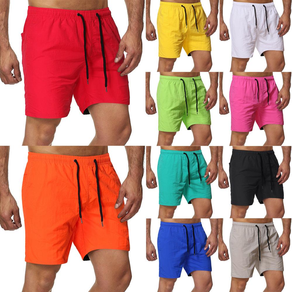 Comercio exterior Amazon 22 verano Pantalones cortos casuales de los hombres color caramelo quinto pantalones de los hombres de diez colores a prueba de agua de secado rápido pantalones de playa
