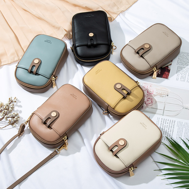 Pequeña Bolsa De fábrica femenina 2023 verano nueva pequeña bolsa de hombro bordado vertical cremallera hebilla mini bolsa de mensajero del hombro