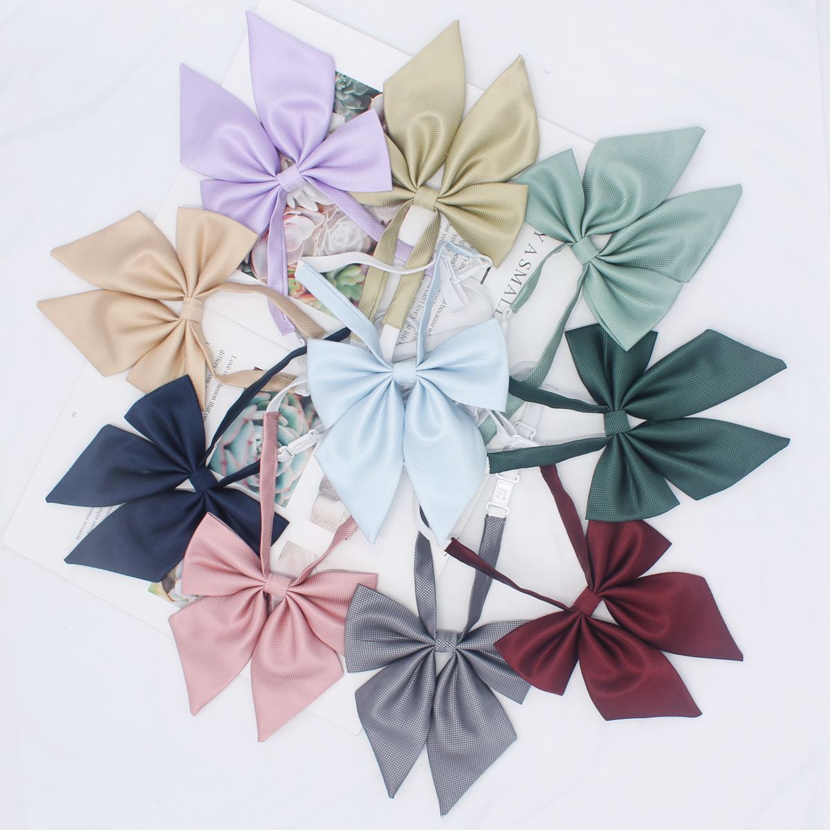 Ventas directas de fábrica magia Plaid JK pajarita de las mujeres ángulo oblicuo gigante pluma raíz arco uniforme escolar marinero traje pajarita en stock