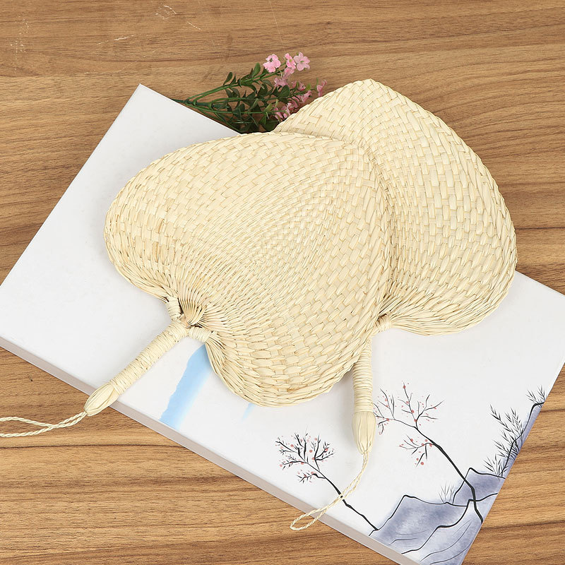 Fan de estilo antiguo chino retro tejido de paja ventilador de mano de verano portátil ventilador de bebé hoja de palma ventilador al por mayor