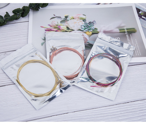 Guitar strings manufacturer wholesale brass strings red copper strings colorful string sets ukulele strings electric guitar strings