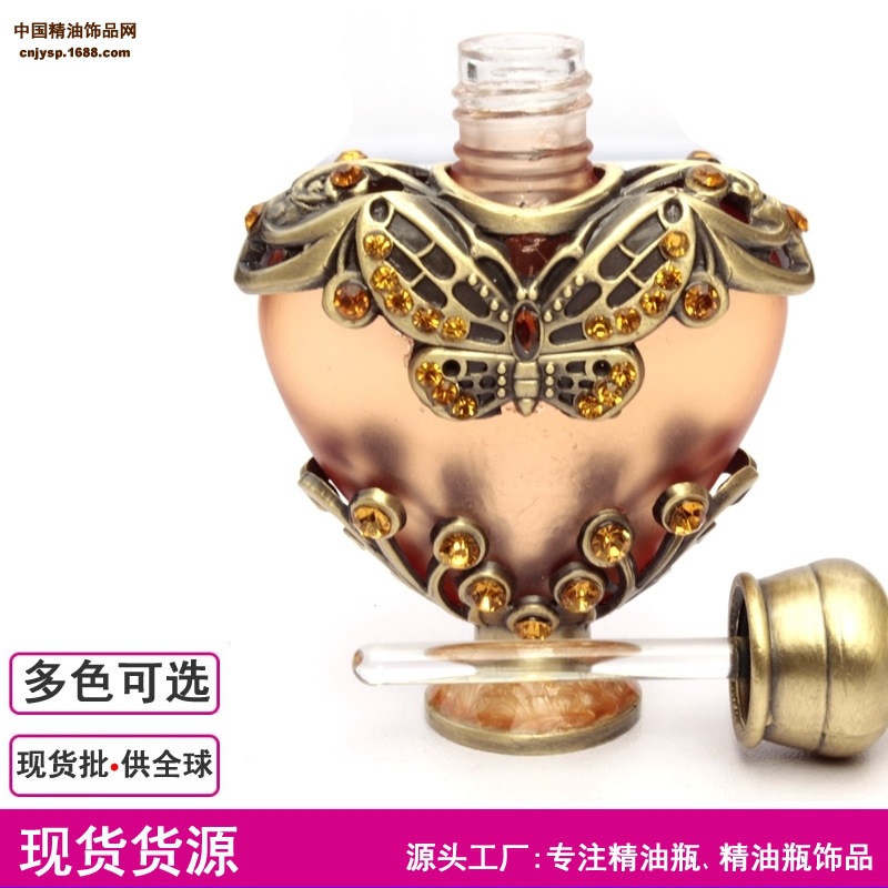 Fabricante de botellas de subenvasadas de perfume spot botella de aceite fino de 10ML al por mayor botella de perfume de Oriente Medio con incrustaciones de piedra en forma de corazón